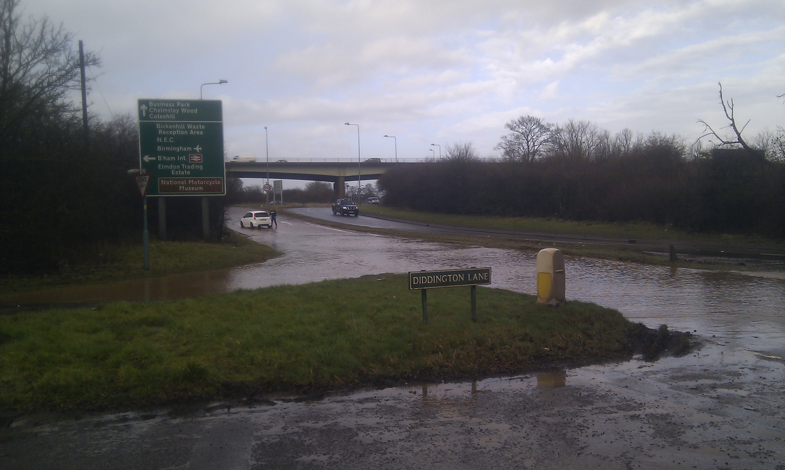 A stranded motorist regrets chancing it through the flooded A452