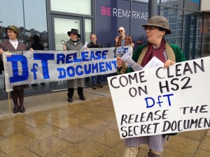 Sherlock Holmes searches for secret HS2 documents at rail summit in Hastings, watched by Miss Marple, Inspector Poirot and Kojak. 31 Mar 2014 (credit: Coombe Haven Defenders)